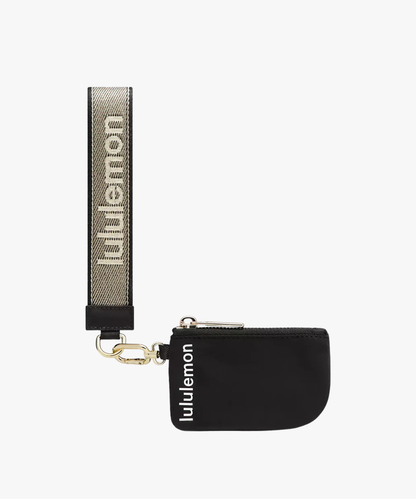 Lululemon Dual Pouch Wristlet Metallic Wordmark (cartera de muñeca con doble compartimento)